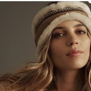 Authentic UGG  embroidered Sheepskin Leather Headband. NWT